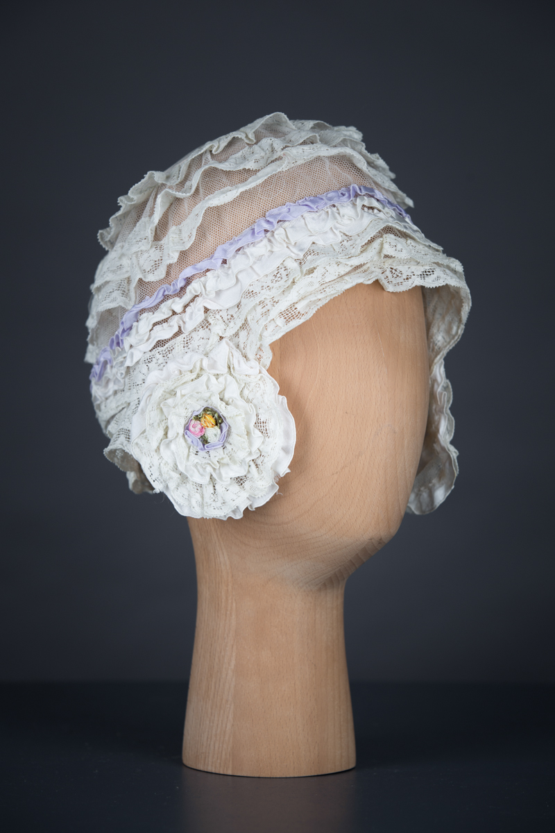 Cotton Leavers Lace Ruffle & Tulle Boudoir Cap With Silk Ribbonwork, c.1920s, UK. The Underpinnings Museum. Photography by Tigz Rice