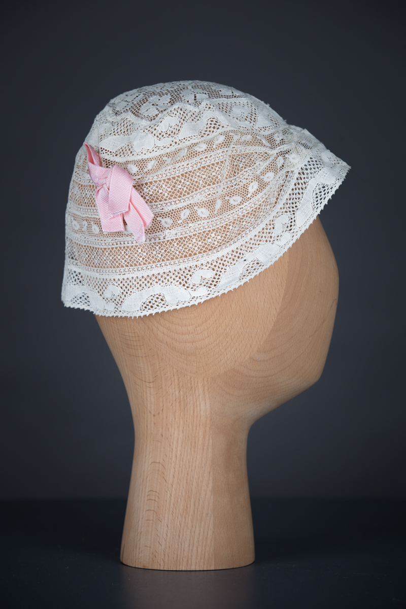 Cotton Leavers Lace & Silk Bow Boudoir Cap, c.1920s, UK. The Underpinnings Museum. Photography by Tigz Rice