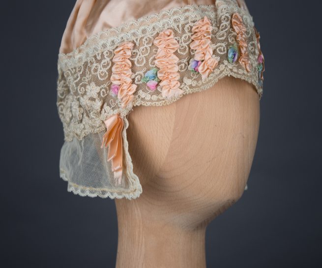 Rayon Satin & Silk Ribbonwork Boudoir Cap, c. 1920s, UK. The Underpinnings Museum. Photography by Tigz Rice