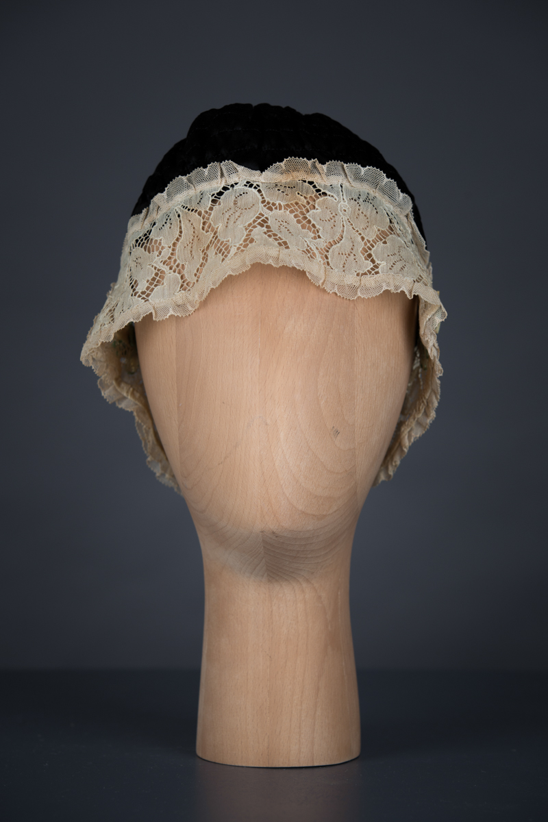 Shirred Black Silk & Ecru Lace Boudoir Cap, c.1920s, UK. The Underpinnings Museum. Photography by Tigz Rice