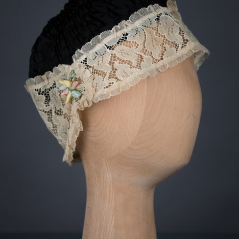 Shirred Black Silk & Ecru Lace Boudoir Cap, c.1920s, UK. The Underpinnings Museum. Photography by Tigz Rice
