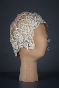 Silk & Schiffli Embroidery Boudoir Cap With Ribbon Lattice, c. 1920s, UK. The Underpinnings Musuem. Photography by Tigz Rice