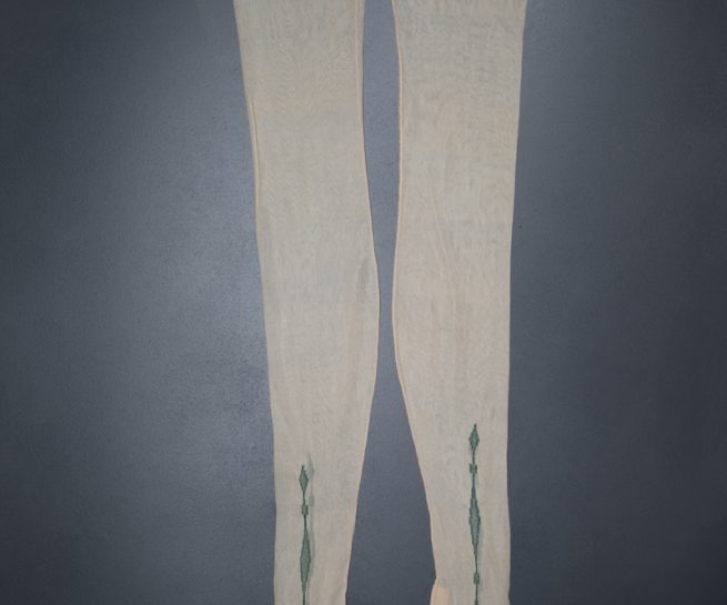 The Underpinnings Museum shot by Tigz Rice Studios 2017Sheer Cream Silk Stockings With Clocked Ankle By Rosaine Hosiery, c. 1920s, USA. The Underpinnings Museum. Photography by Tigz Rice