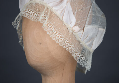 Silk Habotai & Lace Boudoir Cap With Silk Rosettes, c.1920s, UK. The Underpinnings Museum. Photography by Tigz Rice