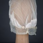 Silk Habotai & Lace Boudoir Cap With Silk Rosettes, c.1920s, UK. The Underpinnings Museum. Photography by Tigz Rice