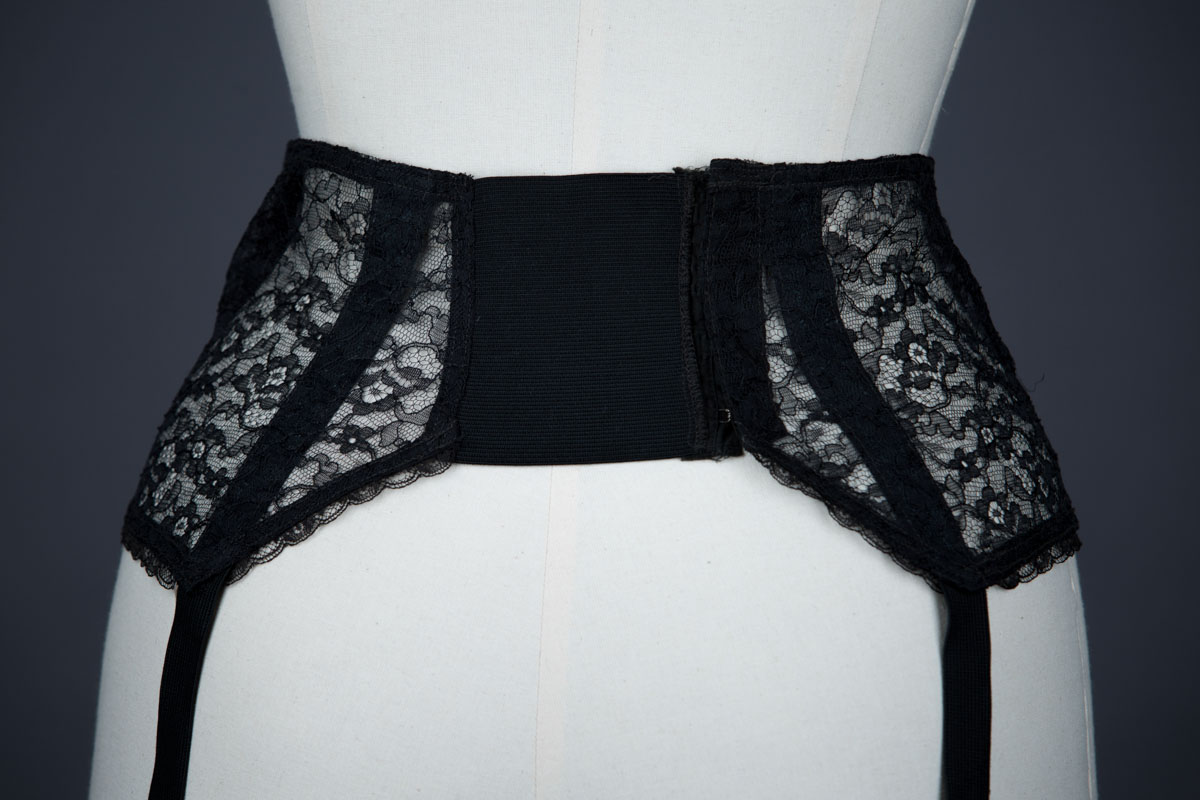 Black Nylon Lace Suspender Belt By Snap, c. 1950s, USA. The Underpinnings Museum. Photography by Tigz Rice