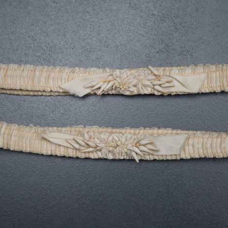 Silk Ribbon & Wax Flower Wedding Garters, c.1920s, USA. The Underpinnings Museum. Photography by Tigz Rice.