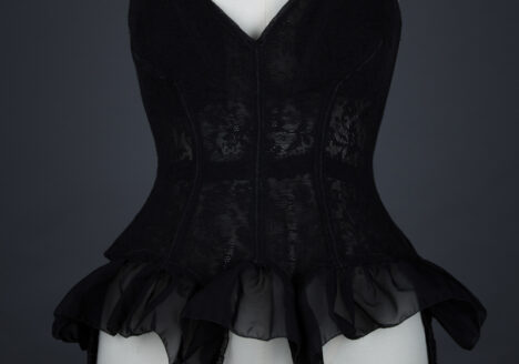 Black Floral Mesh Corselet With Nylon Flounce By Mador, c. 1950s, France. The Underpinnings Museum. Photography by Tigz Rice