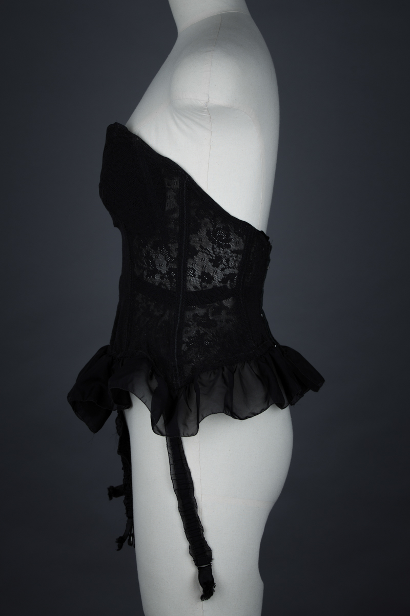 Black Floral Mesh Corselet With Nylon Flounce By Mador, c. 1950s, France. The Underpinnings Museum. Photography by Tigz Rice