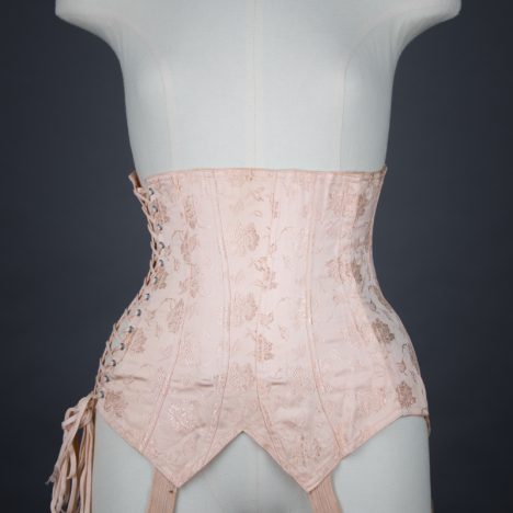 Pointed Tea Rose Brocade Coutil Girdle With Side Lacing, c. 1930s, France. The Underpinnings Museum. Photography by Tigz Rice