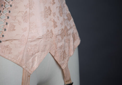 Pointed Tea Rose Brocade Coutil Girdle With Side Lacing, c. 1930s, France. The Underpinnings Museum. Photography by Tigz Rice