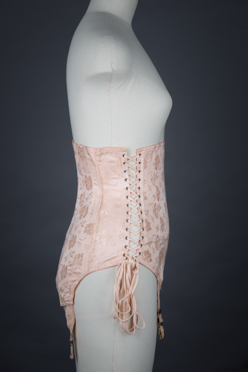 Pointed Tea Rose Brocade Coutil Girdle With Side Lacing, c. 1930s, France. The Underpinnings Museum. Photography by Tigz Rice