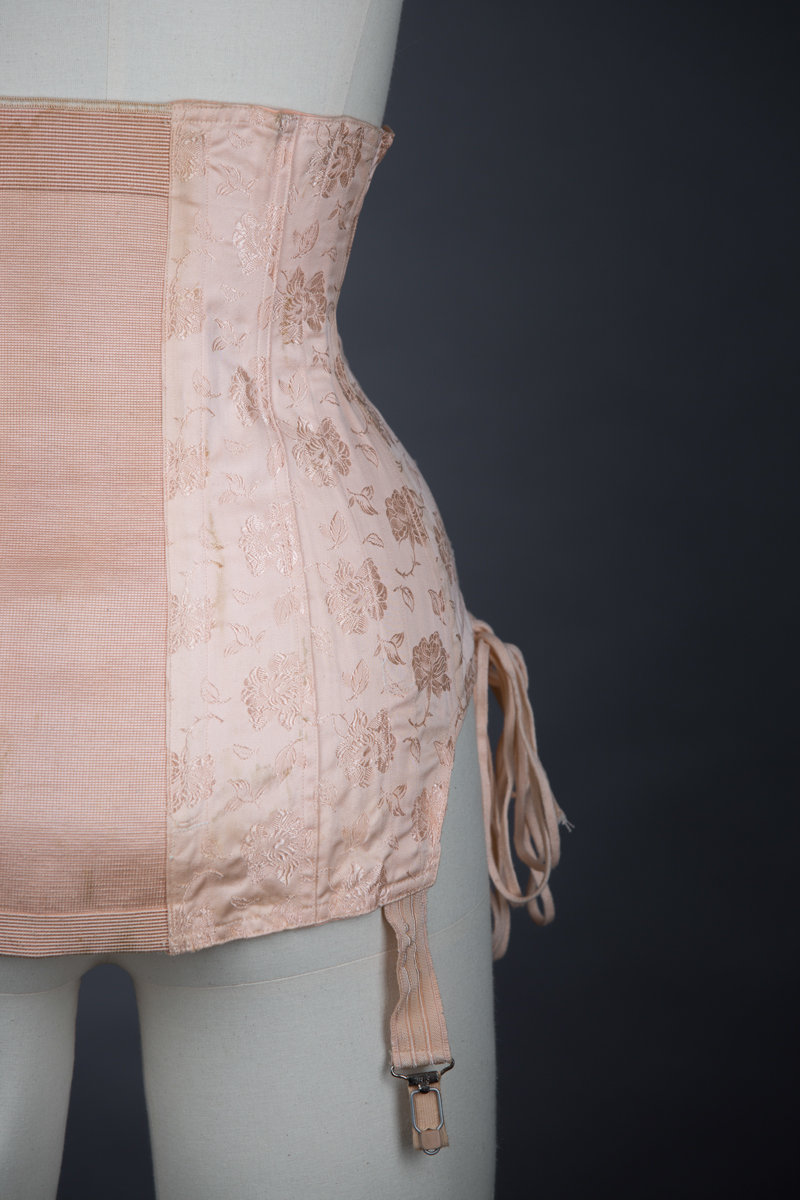 Pointed Tea Rose Brocade Coutil Girdle With Side Lacing, c. 1930s, France. The Underpinnings Museum. Photography by Tigz Rice