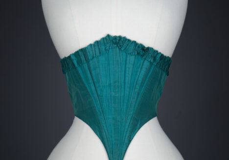 Green Silk Swiss Waist With Ruffled Trim, c. 1860s, USA. The Underpinnings Museum. Photography by Tigz Rice