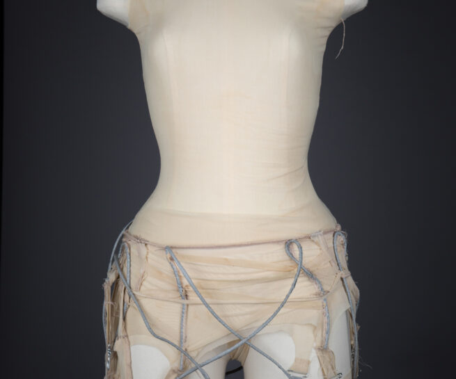 Bandage Mesh Reflective Bodysuit by Rachel Freire, 2010, UK. The Underpinnings Museum. Photography by Tigz Rice.