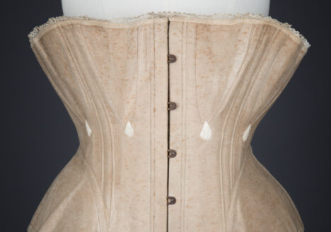 Ecru Cotton Twill Corset With Gores & White Flossing Embroidery, c. 1870s, Great Britain. The Underpinnings Museum. Photography by Tigz Rice.