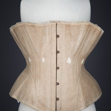 Ecru Cotton Twill Corset With Gores & White Flossing Embroidery, c. 1870s, Great Britain. The Underpinnings Museum. Photography by Tigz Rice.