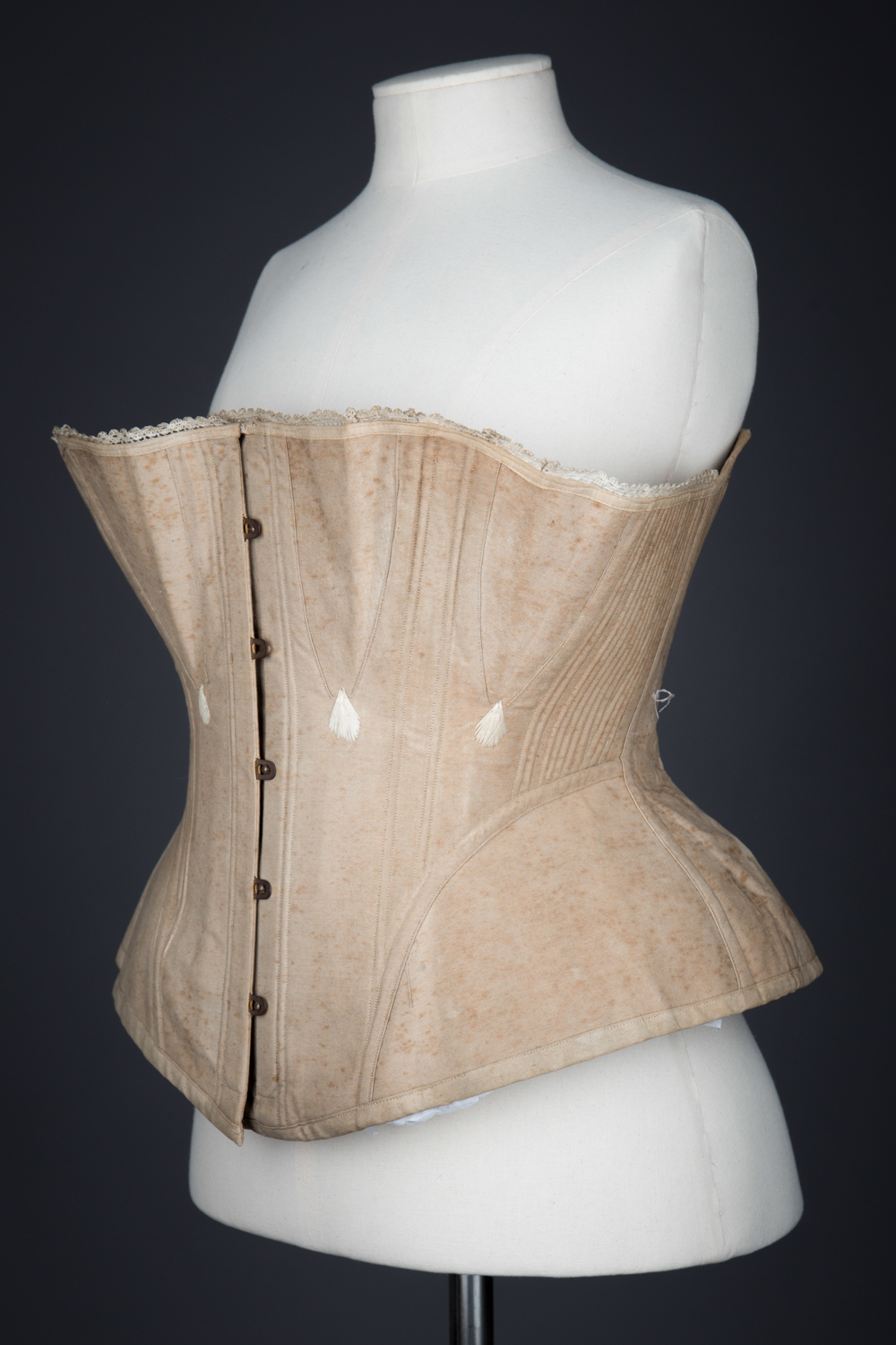 Ecru Cotton Twill Corset With Gores & White Flossing Embroidery, c. 1870s, Great Britain. The Underpinnings Museum. Photography by Tigz Rice.