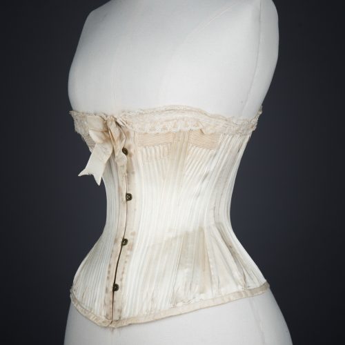 'Stella' Ivory Satin Corset With Flossing Embroidery & Cording by C. T., c. 1900, made in France for the USA market. 
The Underpinnings Museum.
Photography by Tigz Rice.