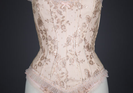 Peach Nylon With Metallic Lace Overlay Corset & Thong by Fifi Chachnil, 1998, France. The Underpinnings Museum. Photography by Tigz Rice.