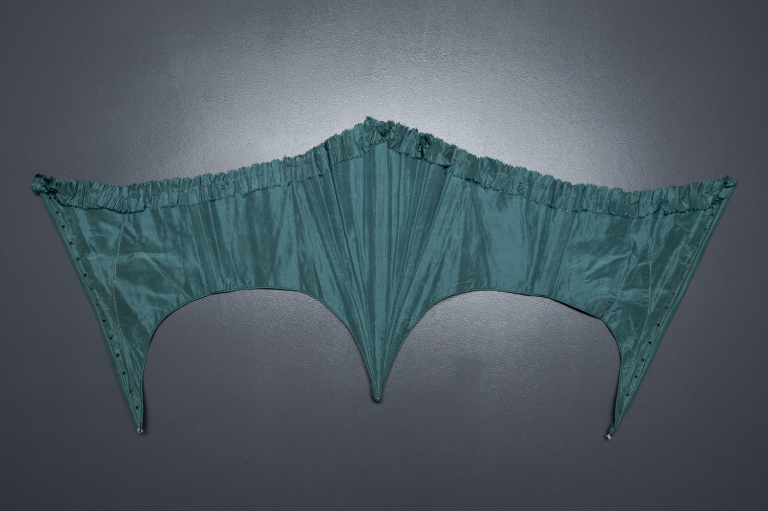 Green Silk Swiss Waist With Ruffled Trim, c. 1860s, USA. The Underpinnings Museum. Photography by Tigz Rice