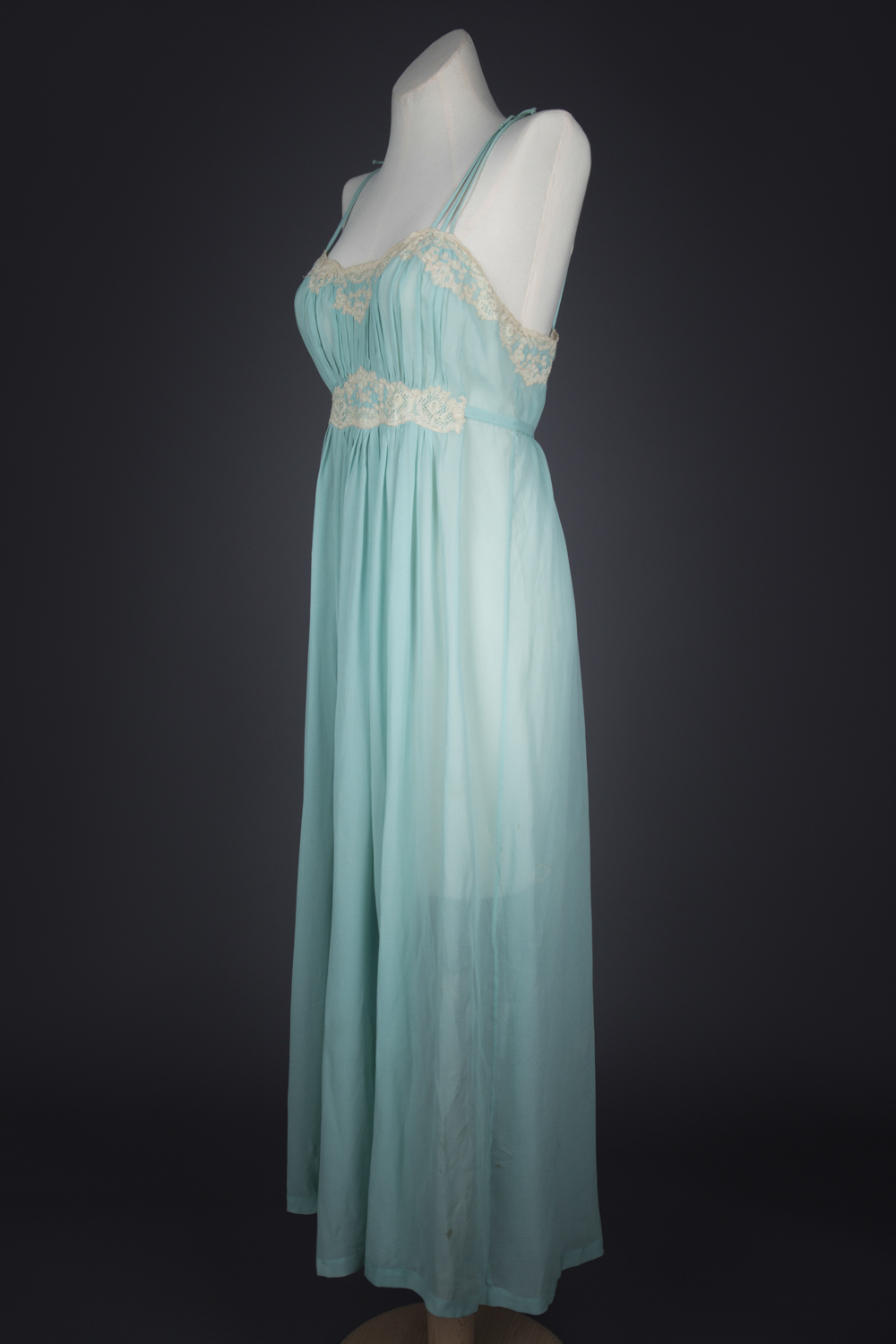 Pleated Silk Georgette Gown With Lace Appliqué by Juel Park, c. 1940s, USA. The Underpinnings Museum. Photography by Tigz Rice.
