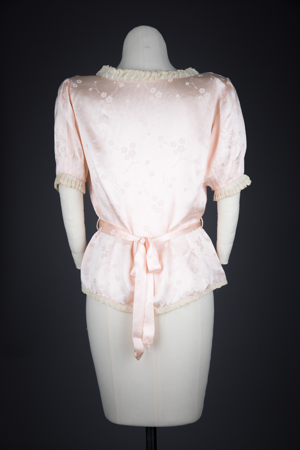 Jacquard Weave Cherry Blossom Silk Bed Jacket With Appliqué & Frog Fastenings, c. 1940s, Made in China for the USA market. The Underpinnings Museum. Photography by Tigz Rice.