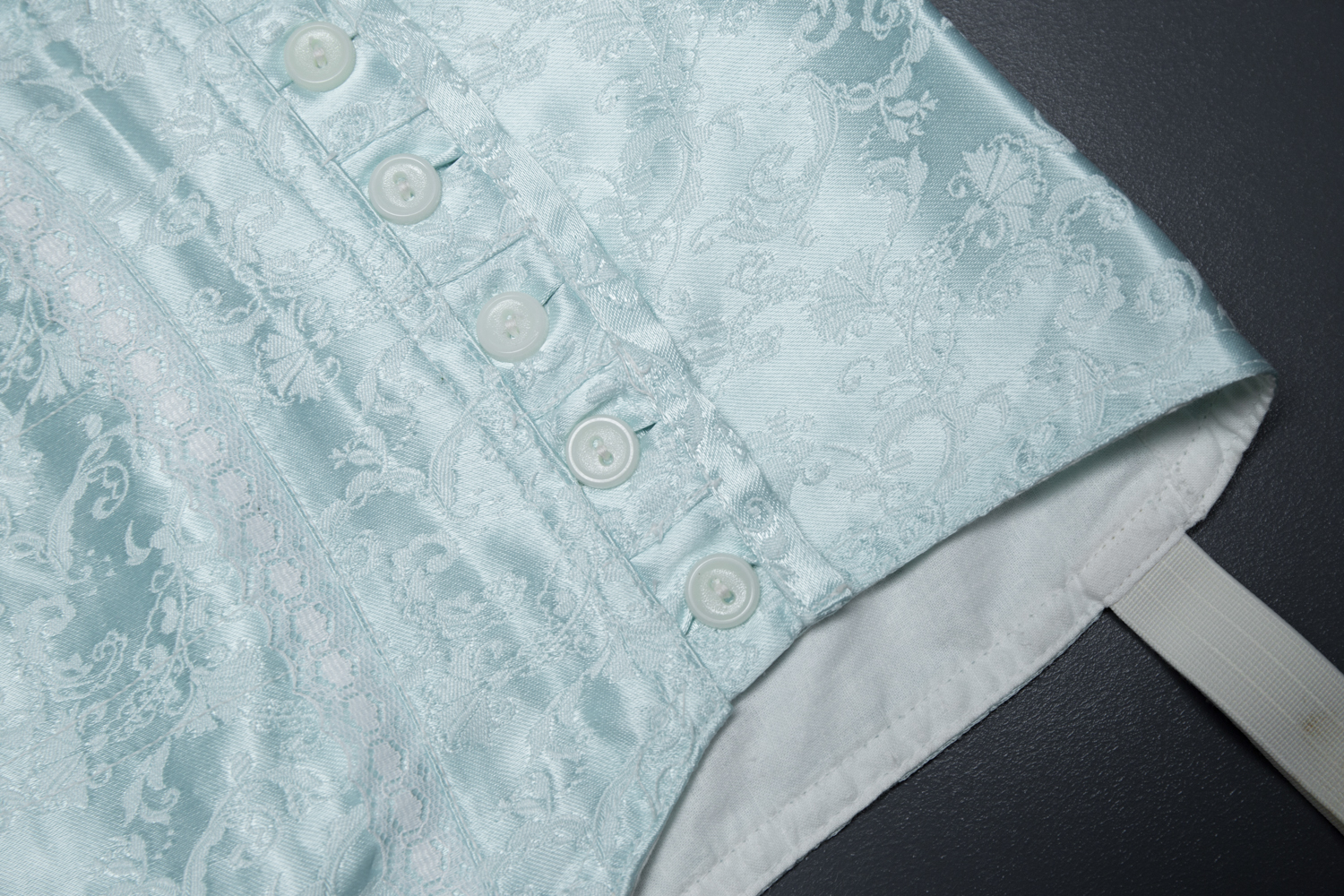Homemade Pale Blue Jacquard Weave Suspender Belt With Plastic Garter Clips, c. 1950s, Russia. The Underpinnings Museum. Photography by Tigz Rice.