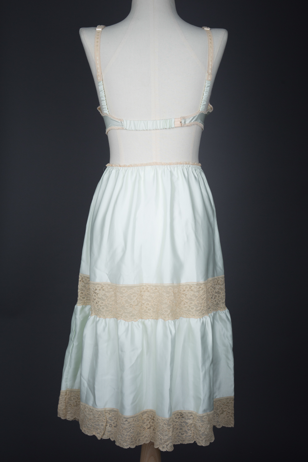 Embroidered Lace & Polyester Satin Bra & Half Slip Set By Janet Reger, c. 1970s, Great Britain. The Underpinnings Museum. Photography by Tigz Rice.