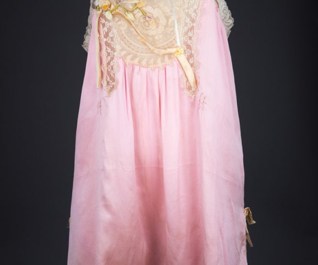 Pink Silk Step In Teddy With Lace Appliqué & Ribbonwork, c. 1920s, USA. The Underpinnings Museum. Photography by Tigz Rice