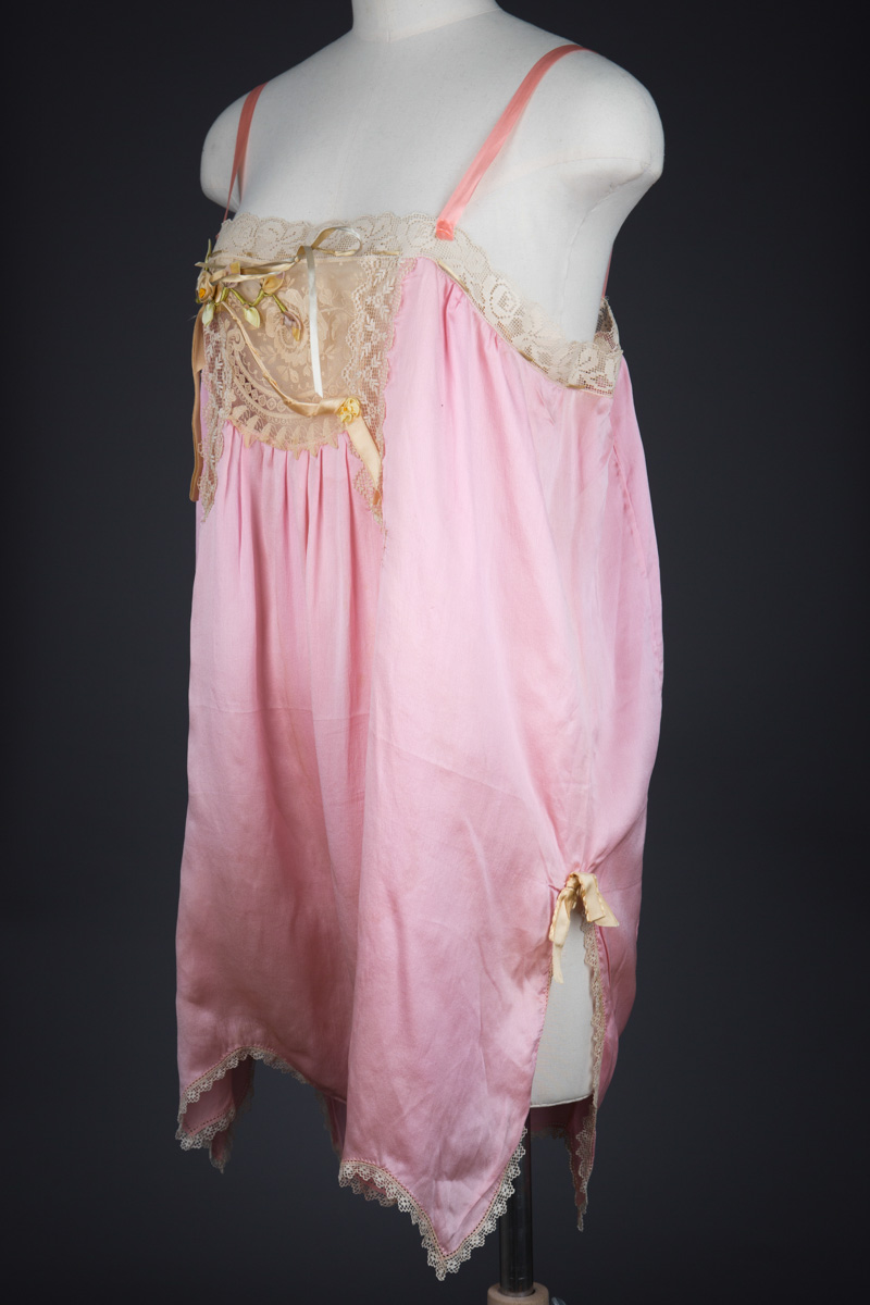 Pink Silk Step In Teddy With Lace Appliqué & Ribbonwork, c. 1920s, USA. The Underpinnings Museum. Photography by Tigz Rice