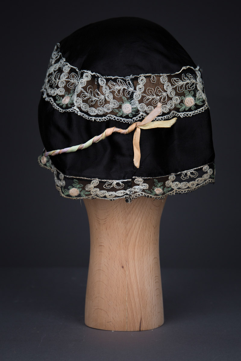 Black Silk Boudoir Cap With Machine Embroidered Trim & Ribbonwork, c. 1930s, Great Britain. The Underpinnings Museum. Photography by Tigz Rice