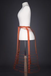 Red Cage Crinolette, c. 1870s, Great Britain. The Underpinnings Museum. Photography by Tigz Rice.