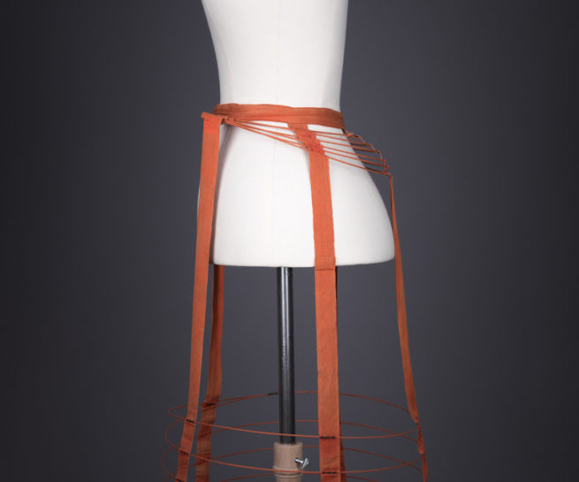 Red Cage Crinolette, c. 1870s, Great Britain. The Underpinnings Museum. Photography by Tigz Rice.