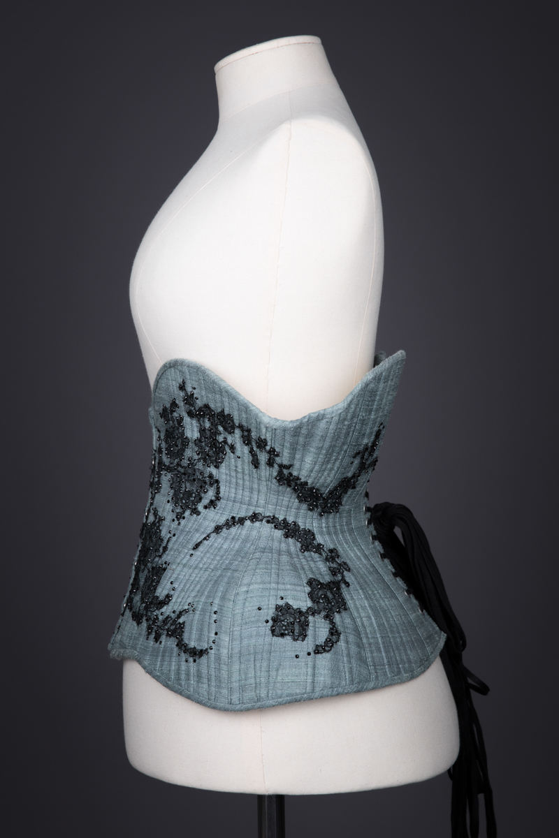 Blue Silk & Lace Appliqué Underbust Corset By Sparklewren, c. 2012, United Kingdom. The Underpinnings Museum. Photography by Tigz Rice.