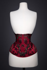 'Crimson Skull' Underbust Corset By Sparklewren, c. 2015, United Kingdom. The Underpinnings Museum. Photography by Tigz Rice.