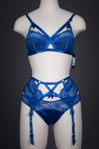 'Madame X' Electric Blue Stretch Lace & Satin Bra, Suspender Belt & Briefs By Dita Von Teese, 2017, Made in China, Designed in the USA. The Underpinnings Museum. Photography by Tigz Rice.