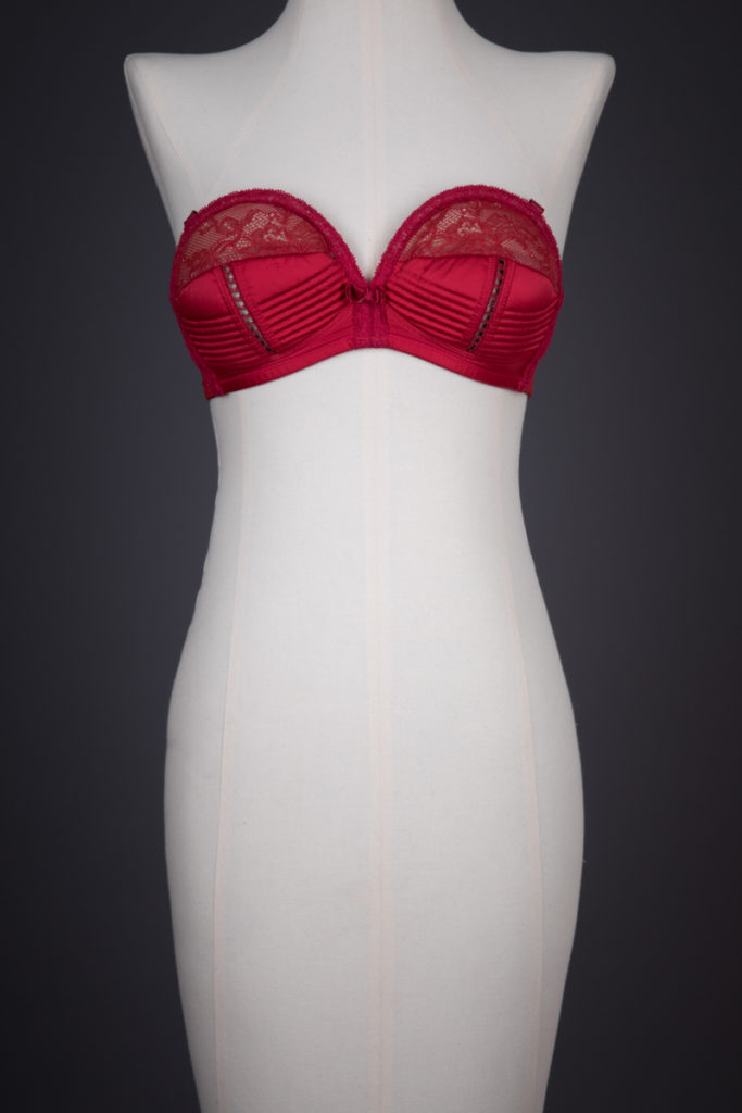 'Her Sexcellency' Red Lace & Satin Overwire Bra By Dita Von Teese, c. 2014, made in China, designed in the USA. The Underpinnings Museum. Photography by Tigz Rice.