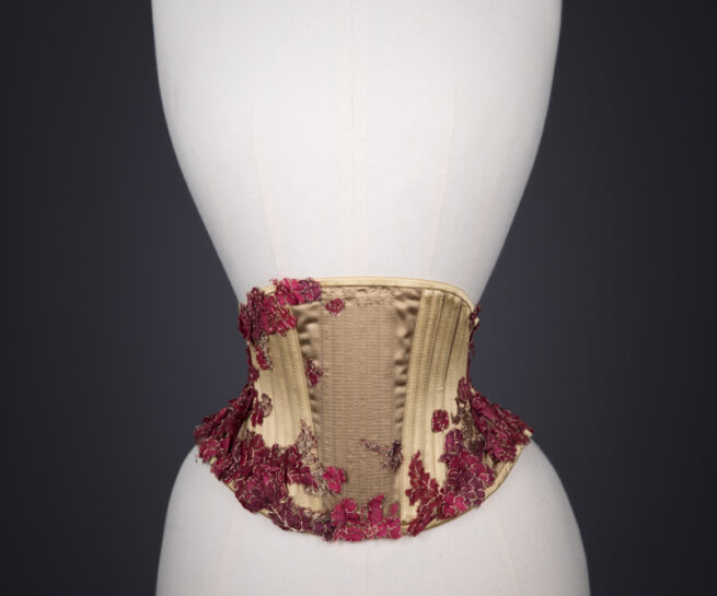 Rubies In Gold Cincher By Sparklewren, c. 2015, United Kingdom. The Underpinnings Museum. Photograpy by Tigz Rice