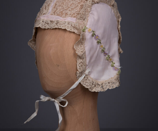 Lace & Celanese Boudoir Cap With Floral Trims, c. 1930s, Great Britain. The Underpinnings Museum. Photography by Tigz Rice.