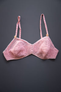 Pink Spiral Cup Crochet Bra, c. 1930s, Great Britain. The Underpinnings Museum. Photography by Tigz Rice.