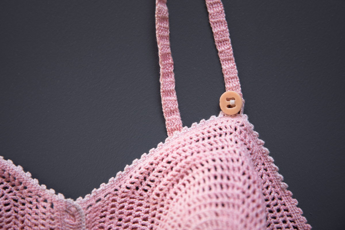 Pink Spiral Cup Crochet Bra, c. 1930s, Great Britain. The Underpinnings Museum. Photography by Tigz Rice.
