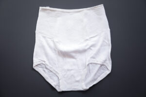 'Lifeguard' Full Support Briefs By Reis, c. 1950s, USA. Photography by Tigz Rice. The Underpinnings Museum.