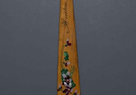 Hand Painted Souvenir 'Menton' Wooden Busk, c. 1850s, possibly France. The Underpinnings Museum. Photography by Tigz Rice