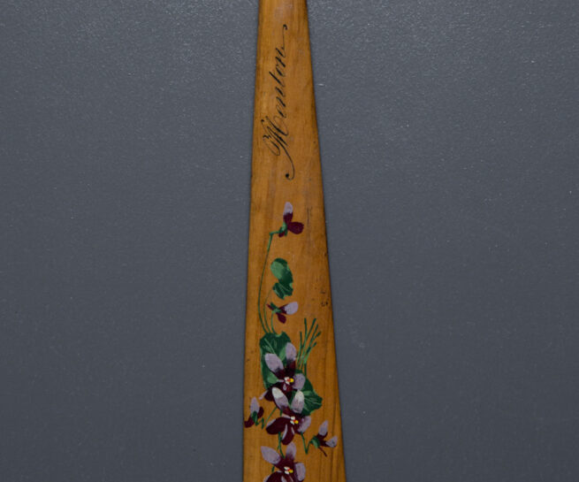 Hand Painted Souvenir 'Menton' Wooden Busk, c. 1850s, possibly France. The Underpinnings Museum. Photography by Tigz Rice