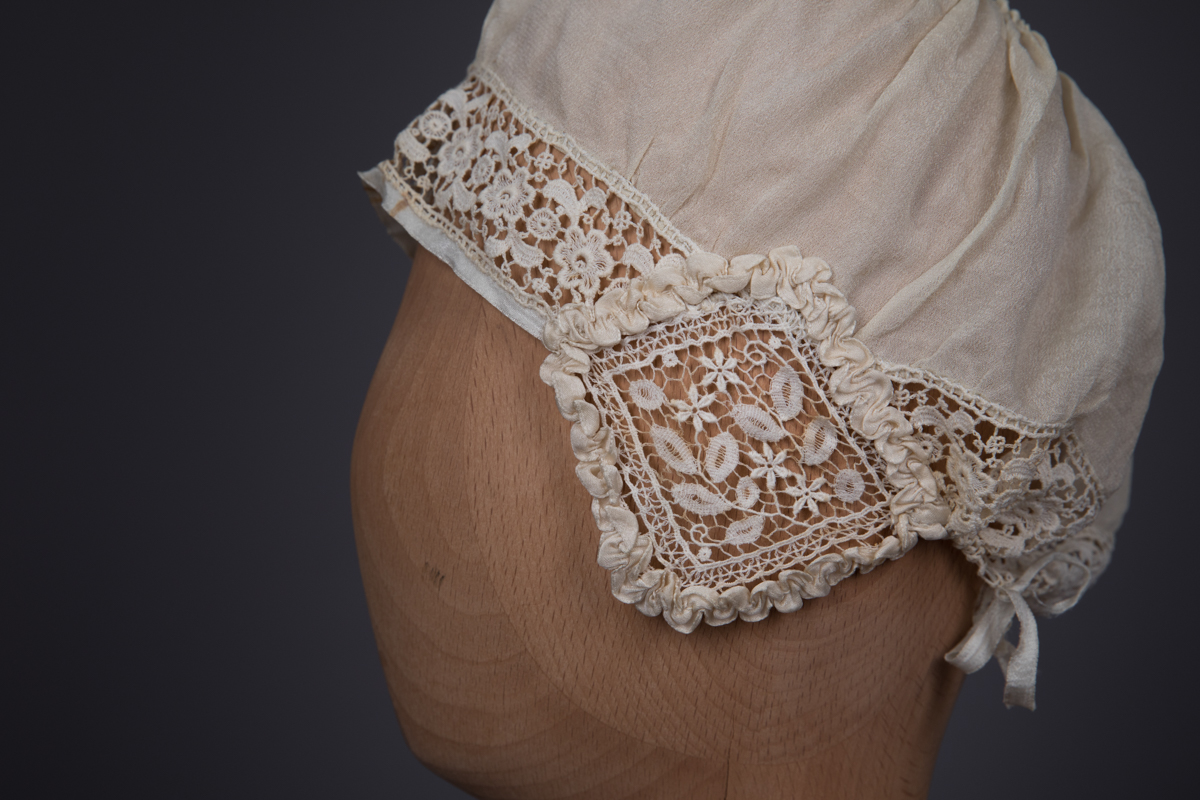 Silk Habotai & Chemical Lace Boudoir Cap With Ribbonwork, c. 1910s, Unknown. Photography by Tigz Rice. The Underpinnings Museum.