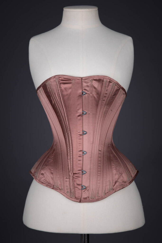 Satin Midbust Corset With Quilted Gores By Sparklewren, begun in 2016 and finished in 2019, UK. The Underpinnings Museum. Photography by Tigz Rice.