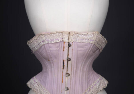 Lilac Herringbone Coutil Corset With Ribbon Slot Lace Trim, c. 1890s, possibly France. The Underpinnings Museum. Photography by Tigz Rice
