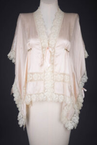 Pale Pink Habotai Silk & Filet Lace Bed Jacket, c. 1920s, USA. The Underpinnings Museum. Photography by Tigz Rice