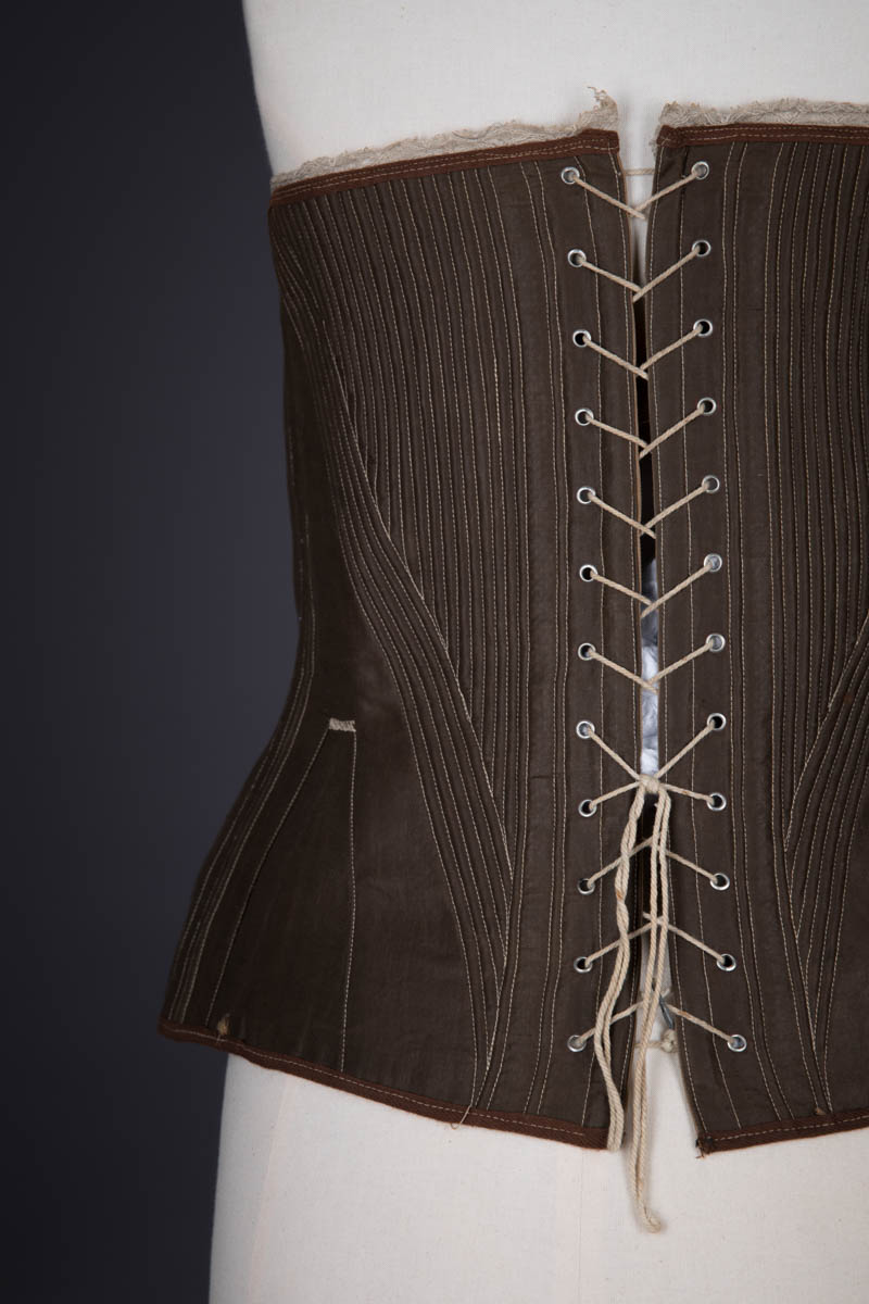 Brown Cotton Corded & Gored Corset, c. 1860s, Great Britain. The Underpinnings Museum. Photography by Tigz Rice.
